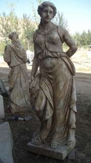   four seasons statue set with an acid bath antique treatment