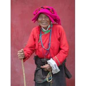  Elderly Tibetan Woman with Red Wall, Tagong, Sichuan 