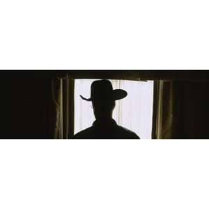  Silhouette of a Man in a Hotel Room by Panoramic Images 