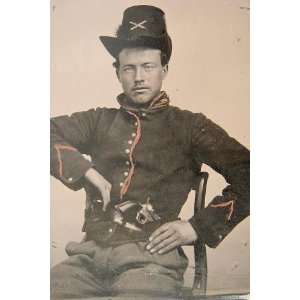   in Union artillery uniform with Hardee hat,revolver