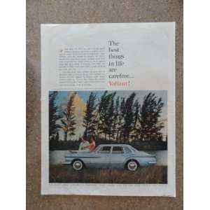 Vintage 60s full page print ad. (blue car/man,woman sitting on hood 