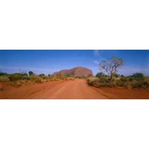  Desert Road and Ayers Rock, Australia by Panoramic Images 