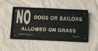 Weird Iron Sign DOGS AND SAILORS KEEP OFF GRASS  