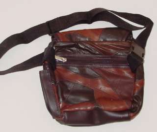 Image Below is of BACKSIDE Showing Additional Zippered Compartment