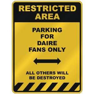  RESTRICTED AREA  PARKING FOR DAIRE FANS ONLY  PARKING 