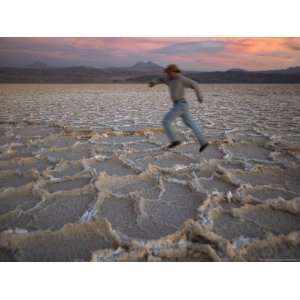 Man Runs Across the Surface of Salar De Atacama Salt Flat National 