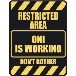   RESTRICTED AREA ONI IS WORKING  PARKING SIGN