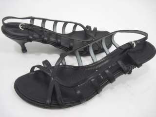 you are bidding on a pair of christian lacroix black satin strappy 