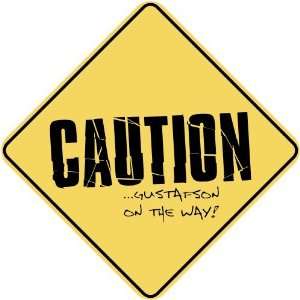   CAUTION  GUSTAFSON ON THE WAY  CROSSING SIGN