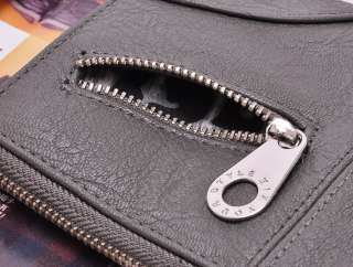   zipper pocket outside for coins holds everything you need to carry