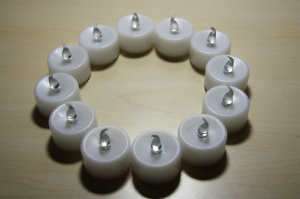 12 Battery LED Wedding Tealight Candles Yellow NEW  