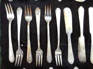   there are 41 pieces of flatware and 3 felt bags and one silver
