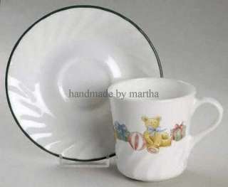   is a Mug/cup And Saucer Set in the Holiday Magic pattern by Corning