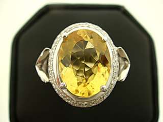 6CT VVS YELLOW EMERALD WITH 1.45CTW OF 268 WHITE DIAMONDS ENGAGEMENT 