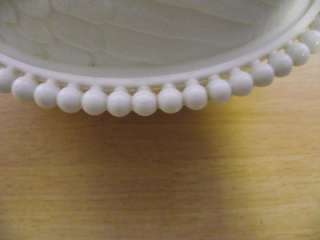 have this milk glass chicken dish. The maker is unknown. The chicken 