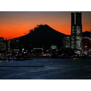 Yokohama City is Lit up Under Dusk at Sunset with the Backdrop of the 