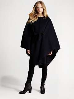 neck Long cape sleeves Faux leather self tie at waist Slash pockets 