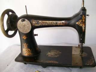 Singer Sphinx Treadle Sewing Machine Bullet Shuttle 1895  