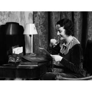  Woman Sitting at Desk at Home, Writing a Letter 